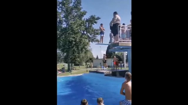 Fat Guy jumps into the pool