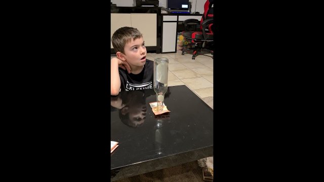 Boy Outsmarts Dad and Pulls Money Bill Kept Under Bottle Without Touching It