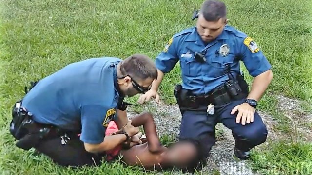 Ten-year-old brought to the ground by police officers