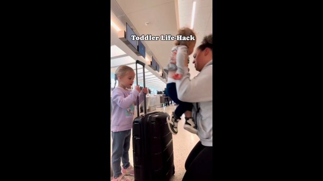 Method of carrying a child with a suitcase [VIDEO]