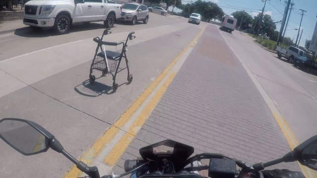 Good samaritan bringing an old man his runaway walker [VIDEO]