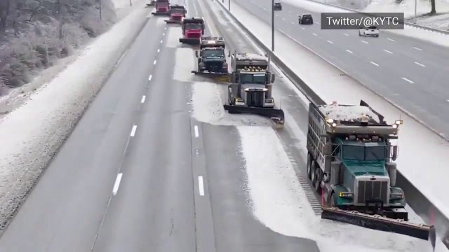 Team of snowplows clears ice off Kentucky interstate