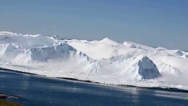 Ilulissat Icefjord - Large iceberg breaking over [VIDEO]