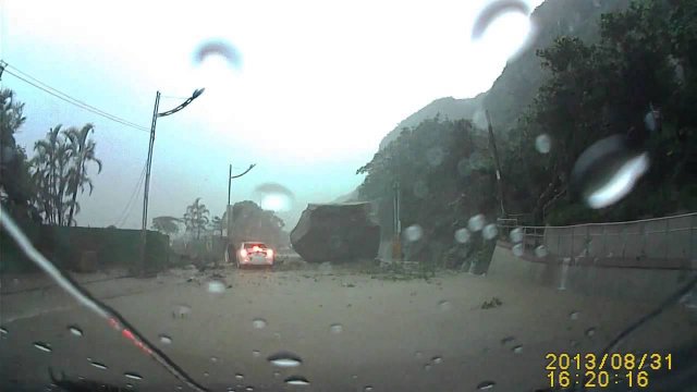 Is this the luckiest driver in the world? Huge boulder just misses car in Taiwan landslide