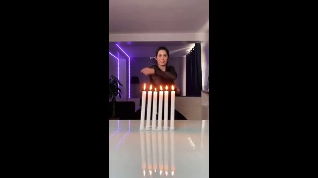 Girl Skilfully Puts Out Candles With Nunchaku