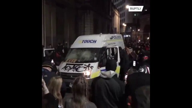Protest that turned violent outside a city-centre police station.