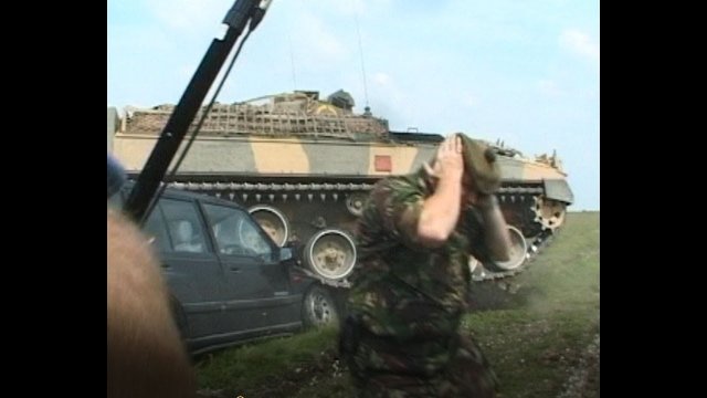 Tank destroys cameraman's car video
