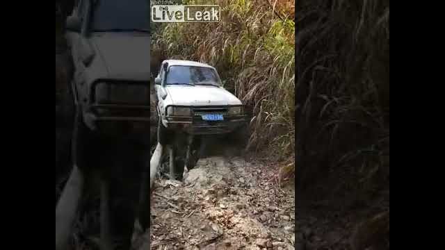 Hardcore driver and his ride through a landslide