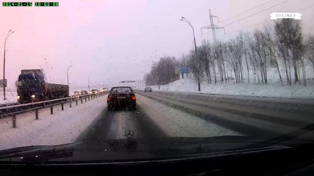 Woman in Mercedes and unsuccessful overtaking on a snowy road