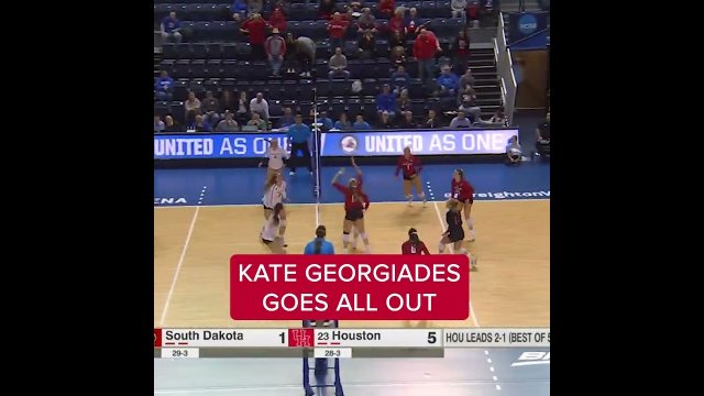 Table-crashing rally save in college volleyball [VIDEO]