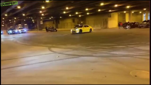 A woman fell out of a drifting car