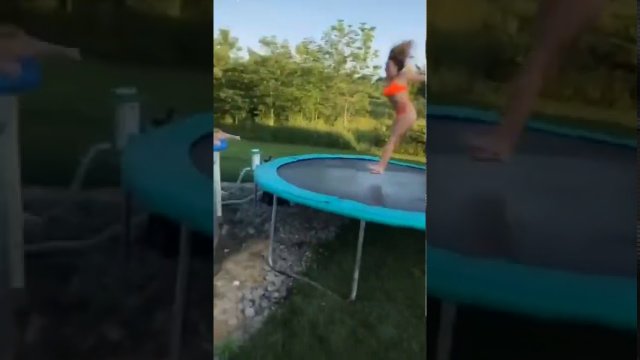 Teen girl tries to leap off roof and bounce into a swimming pool using a trampoline…