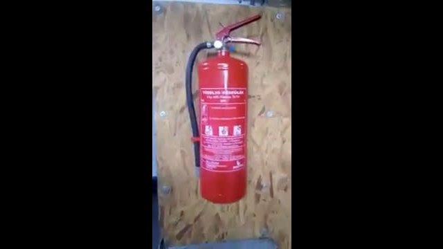Fire extinguisher with additional assortment.