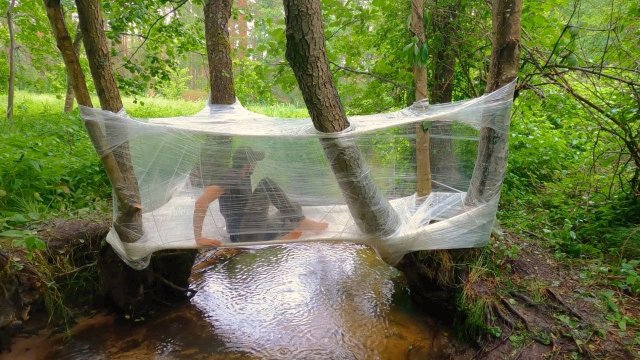 Building an Amazing Shelter Over the WATER with Plastic Wrap [VIDEO]