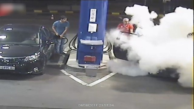 Gas pump worker douses cigarette and stubborn smoker with fire extinguisher