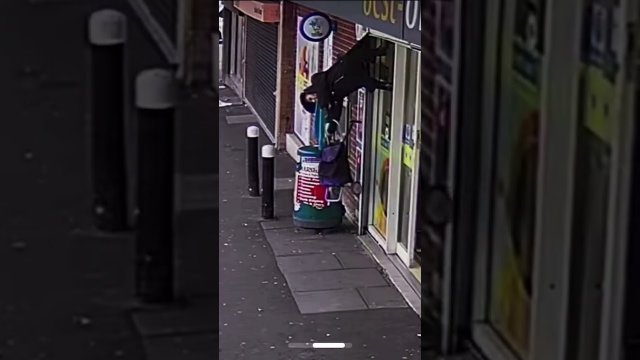 A shopper got stuck on the shutters and lifted into the air until a helpful worker from the store