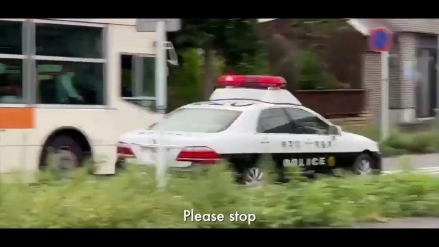 A guy on a scooter versus a policeman in a police car