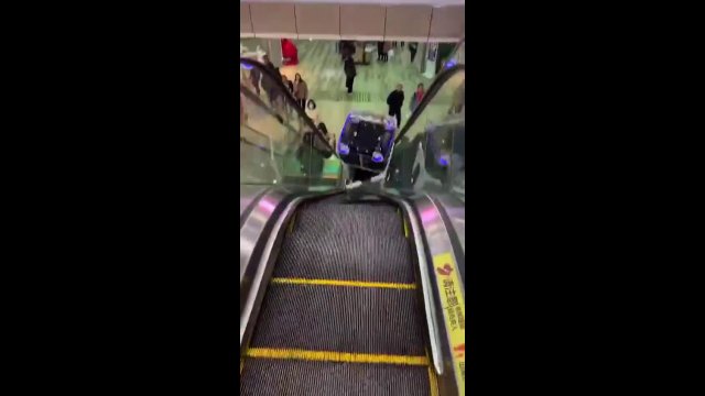 WCGR having a robot go down an escalator