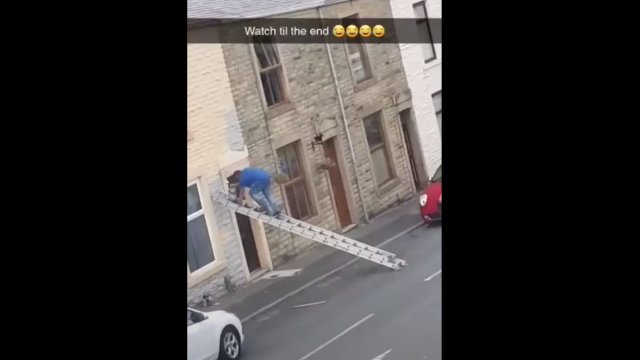 Guy falls off ladder with paint