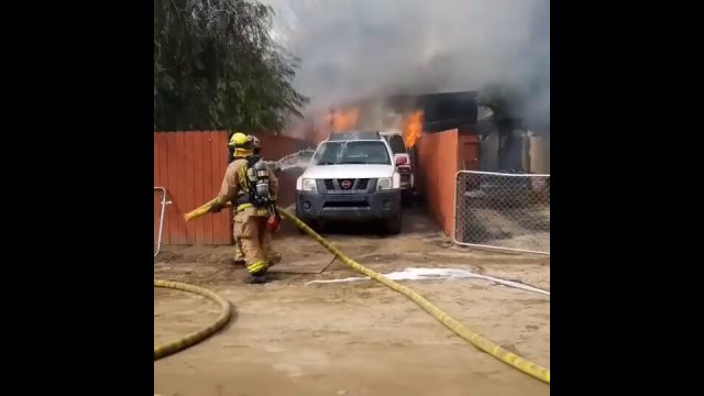Man runs into burning home to save his dog [VIDEO]