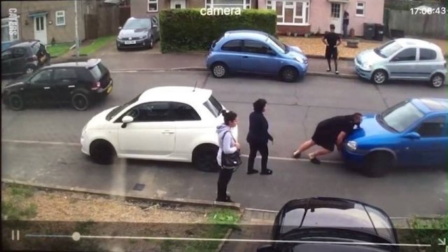 Neighbor Lifts Car Out Of The Way Of Drive [VIDEO]