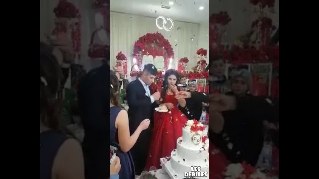 World’s moodiest groom completely loses it in front of guests during botched cake cutting ceremony
