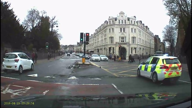 Armed cyclist tackled by pedestrians - Cardiff