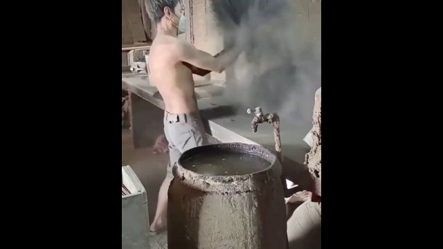 Hand-making hundreds of incense sticks at once