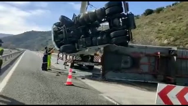 Crane operator miscalculates the weight of a truck he's moving
