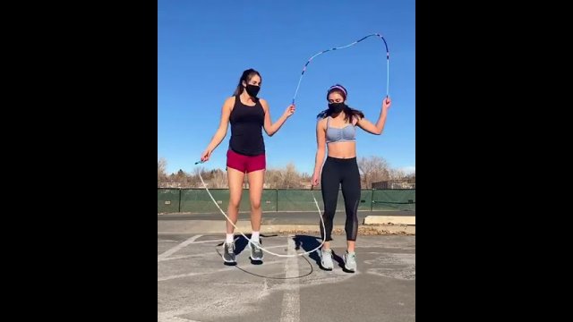 Duo Jumps Two Ropes In Coordination