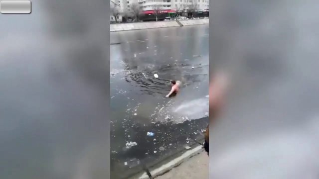 Man Plunges Into Icy River To Rescue Drowning Dog