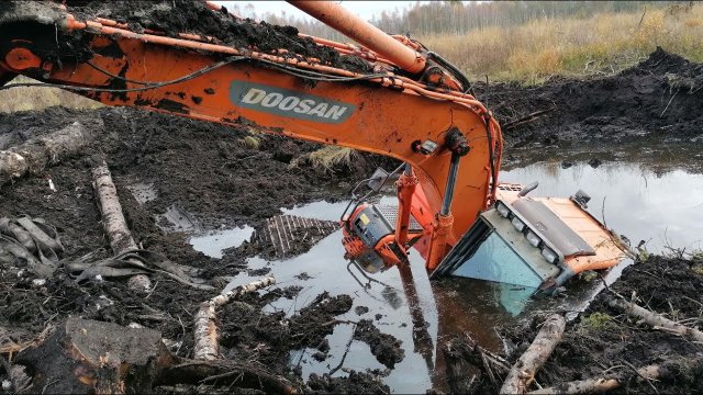 Excavator stuck in Deep mud