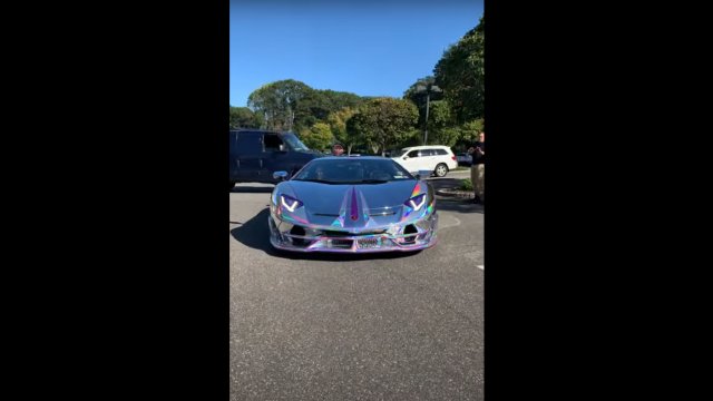 Rainbow chrome Lambo pulls out of parking spot