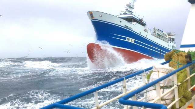 Fishing Trawler in Rough Seas and Massive Waves