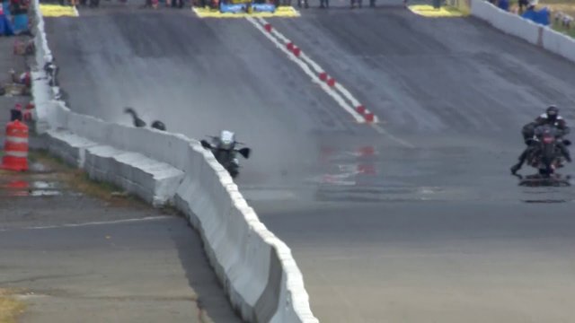 Top Fuel Racer Hits Wall At 215 MPH [VIDEO]