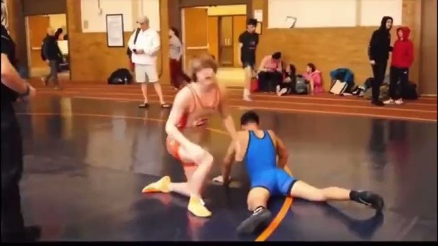 High School Wrestler Sucker Punches Opponent After Losing Match [VIDEO]