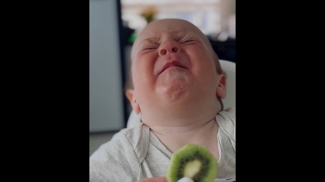 Baby has hilarious reaction to kiwi taste [VIDEO]