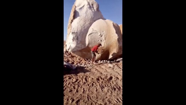 Man Splits Massive Stone Easily and Quickly