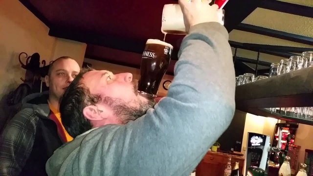 An impressive bar trick. Drink a Guinness beer without touching it