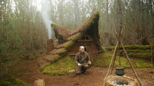 Dude builds himself a hut out of sticks and clay