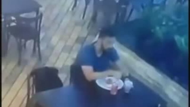 A policeman saves the life of a random customer in a restaurant