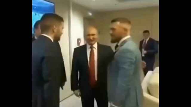 Conor McGregor was given a warning for putting his arm over Vladimir Putin [VIDEO]