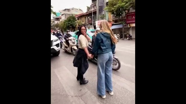 Crossing the street in Vietnam looks a bit wild! [VIDEO]