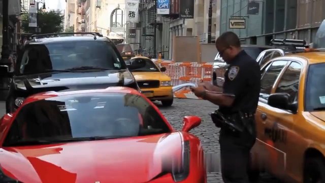 Ferrari owner drives over police officer’s foot [VIDEO]