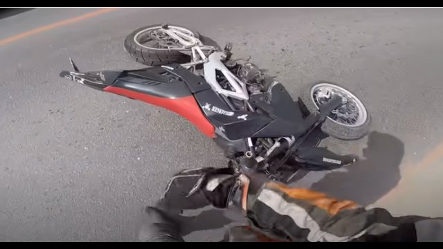 Motorcycle Rider Bumps Into Surprise Barrier