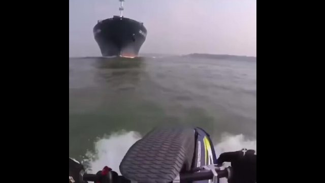 Jet ski goes next to a cargo vessel and finds out [VIDEO]