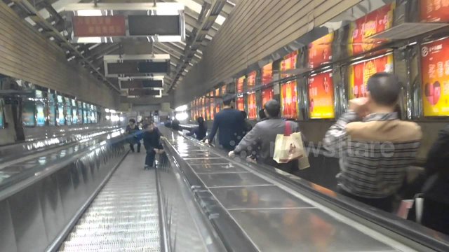 Longest escalator in China takes two-and-a-half minutes to reach ground [VIDEO]