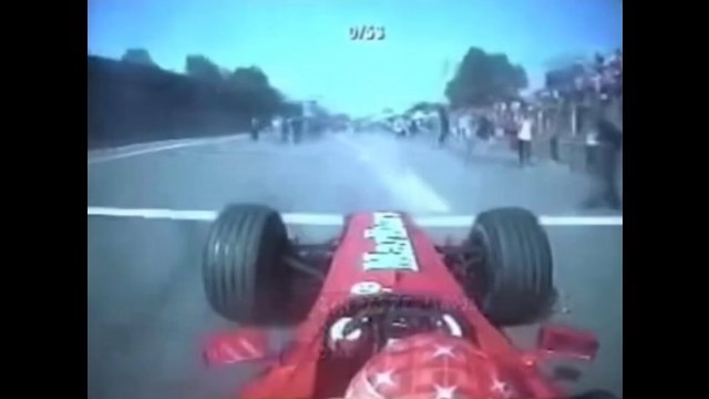 Michael Schumacher somehow avoids hitting fans after winning the 2000 Italian Grand Prix [VIDEO]