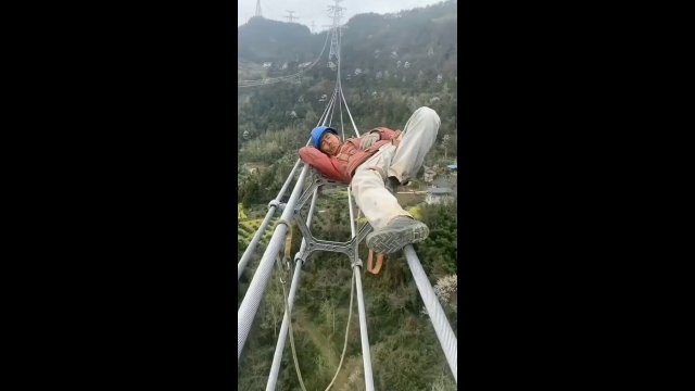 Power line workers in China taking a break in between busy operation shifts [VIDEO]