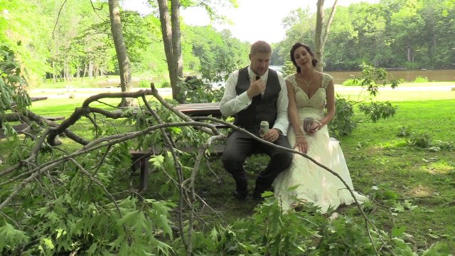 Bride and groom barely dodge falling tree